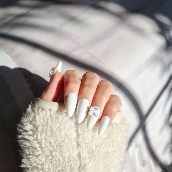 White nails with bows